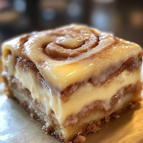 Cinnamon Roll Gooey Butter Cake with Lemon Cream Cheese Glaze 🍋🍰✨

￼

Ingredients:

For the Cake Base:  
- 1 box yellow cake mix  
- 1 large egg  
- ½ cup unsalted butter, melted  
- 1 teaspoon vanilla extract  

For the Cinnamon Gooey Filling:  
- 8 oz cream cheese, softened  
- 2 large eggs  
- 1 teaspoon vanilla extract  
- 2 cups powdered sugar  
- ½ cup unsalted butter, melted  
- 2 tablespoons ground cinnamon  
- ½ teaspoon ground nutmeg  

For the Lemon Cream Cheese Glaze:  
- 4 oz cream cheese, softened  
- 1 cup powdered sugar  
- 2 tablespoons lemon juice  
- 1 teaspoon lemon zest  
- 1-2 tablespoons milk (for consistency)  

Directions:

1. Preheat the Oven:  
   Preheat your oven to 350°F (175°C). Grease a 9x13-inch baking dish.

2. Prepare the Cake Base:  
   In a medium bow Cake Mix Cinnamon Rolls, Gooey Cake, Lemon Cream Cheese, Cake Base, Gooey Butter Cake, Cream Cheese Glaze, Yellow Cake, Lemon Cream, Yellow Cake Mixes