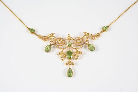 AN EDWARDIAN PERIDOT AND SEED PEARL NECKLACE the gold openwork foliate design is set overall with Peridot Gold Necklace, Edwardian Necklace, Edwardian Jewelry, Pearl Design, Seed Pearl, Fruit Basket, Jewelry Inspo, Vintage Jewellery, Men Necklace