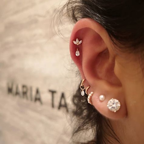 Maria Tash on Instagram: “Place our Floating Pear Diamond Threaded Stud below a Lotus to make an elegant point. ⁠ ⁠ 📸: @_daniellebodypiercing_ #piercer” Helix Piercings, Maria Tash, Bal Harbour, Love My Body, Jewelry Luxury, Helix Piercing, Pear Diamond, Helix, Kuwait