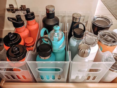 Blender Bottle Organization, Vitamin Storage Kitchen, Organizing Water Bottles, Fridge Organization Water Bottles, Class Water Bottle Storage, How To Organize Water Bottles, Kitchen Storage Water Bottles, Classroom Water Bottle Station, Water Bottle Station Classroom