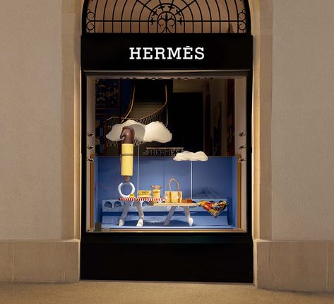 whimsical window display intertwining the mundane & surreal marks Hermès zurich Hermes Window Display, Luxury Window Display, Hermes Window, B Image, Store Window Display, The Mundane, Store Window, Geometric Form, Store Display