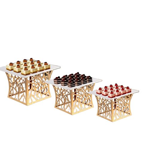 Catering decorations wedding riser buffet stand luxury gold plated buffet food display rack display stand with white plate https://m.alibaba.com/product/1600124237060/Catering-decorations-wedding-riser-buffet-stand.html?__sceneInfo={"cacheTime":"1800000","type":"appDetailShare"} Luxury Catering Display, Food Risers, Buffet Food Display, Food Display Stands, Buffet Stand, Catering Food Displays, White Platter, Luxury Food, Wedding Buffet