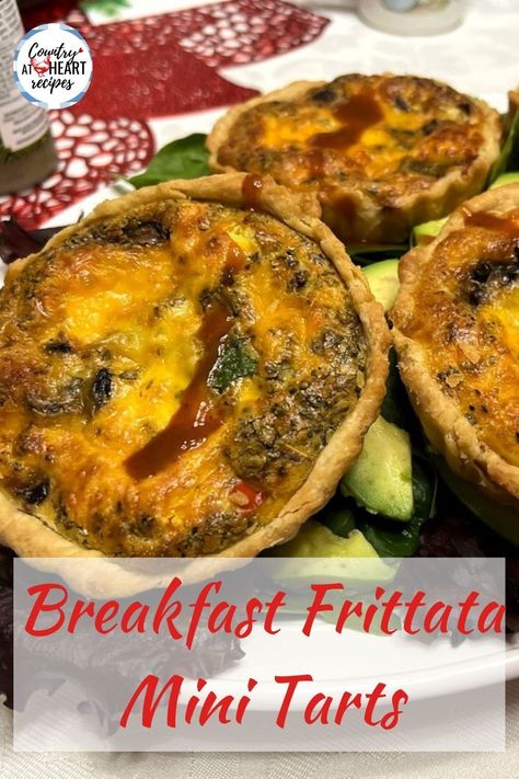 Breakfast Frittata Mini Tarts are a great addition to a special brunch or holiday table. Individual tart shells with vegetables, cheese, and egg filling. Place them on a bed of spring salad with avocados and drizzle with your favorite hot sauce.  #breakfastfrittataminitarts #frittataminitarts #breakfasttarts #frittata #tartlets #breakfastdishes #brunch #italianfood #usaminitartpan #countryatheartrecipes  https://countryatheartrecipes.com/2024/04/breakfast-frittata-mini-tarts/ Impressive Breakfast, Sunday Meals, Breakfast Tart, Breakfast Frittata, Mini Tarts, Gluten Free Italian, Mini Tart Pans, Heart Recipes, Italian Breakfast