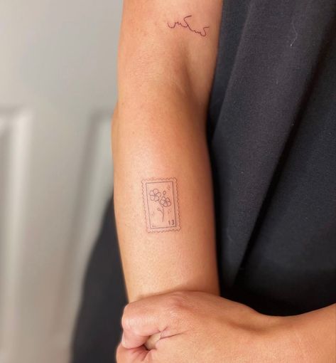 Tiny Script Tattoo Placement, Stamp Tattoo Ideas Design, Poppy Postage Stamp Tattoo, Stamp Tattoo Butterfly, Poppy Stamp Tattoo, Floral Stamp Tattoo, Post Stamp Tattoo Ideas, Tattoo Timbre, Small Stamp Tattoo