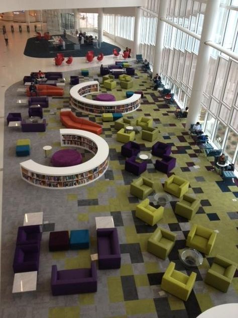 The James B. Hunt Library at North Carolina State University is a revolution in information storage. At the Hunt, robots fetch the books. Two million Meja Sofa, School Library Design, High School Library, Library Inspiration, Dream Library, School Interior, Library Furniture, Modern Library, Corporate Interiors