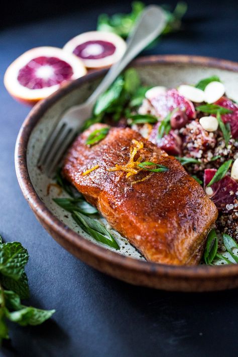 A healthy delicious recipe for Moroccan Salmon, paired with a Quinoa salad with orange, mint, almonds and olives. Simple, fast and easy. | www.feastingathome.com Moroccan Salmon Recipe, Moroccan Salmon, Feasting At Home, Salad Quinoa, Fast Easy Dinner, Healthy Salmon Recipes, Healthy Salmon, Quinoa Salad, Delicious Healthy Recipes