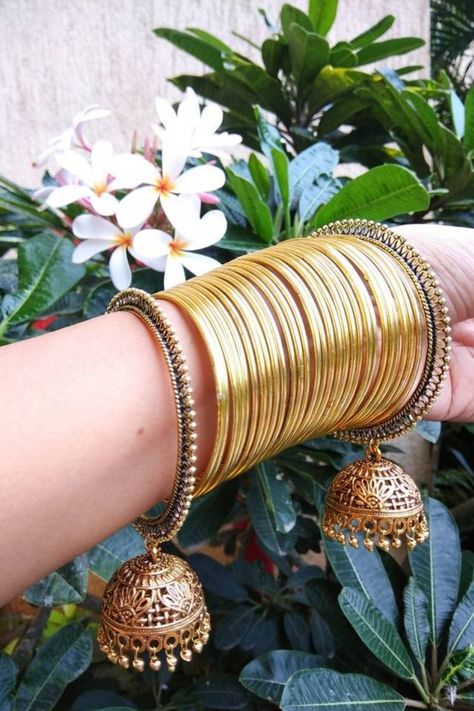 GOLDEN LIGHTWEIGHT JHUMKI BANGLES WITH SHINING METAL FOR TRENDY LOOK Golden Bangles Design, Bangles Design Latest, Women Gold Bangles, Bridal Jewellery Earrings, Bridal Jewels, Kundan Bangles, Bridal Jewelry Vintage, Glass Bangles, Fancy Jewellery Designs