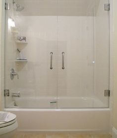 shower tub enclosures | heard right, a beautiful frameless shower ... Glass Tub Enclosure, Shower Tub Doors, Diy Shower Door, Tub With Glass Door, Bathroom Facelift, Secondary Bathroom, Makeover Kamar Mandi, Bathtub Shower Doors, Tub Enclosures