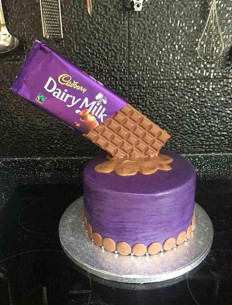 Cadbury gravity cake Cadburys Birthday Cake Ideas, Double Decker Cake, Cadbury Fruit And Nut, Button Cake, Gravity Cake, Cake Hacks, Cadbury Dairy Milk, Celebration Cake, Birthday Cake Ideas