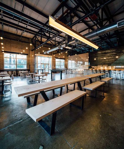 Light wood tops mixed with dark bases Taproom Design, Taproom Ideas, Brewery Interior, Beam Lighting, Brewery Decor, Brewery Bar, Industri Modern, Brewery Restaurant, Brewery Design