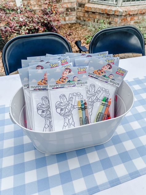 Toy Story Gift Table, Toy Story Themed Goodie Bags, Simple Toy Story Birthday, Two Infinity And Beyond Birthday Activities, Toy Story Party Outfit, Two Infinity And Beyond Balloon Garland, Outdoor Toy Story Party, Toy Story Muted Colors, Two Infinity And Beyond Party Favors