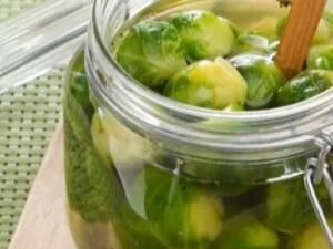 Savor the Unique Flavor of Frog Balls (Pickled Brussels Sprouts): A Tangy Twist on a Classic Pickle - NewsBreak Frog Balls, Pickled Brussels Sprouts Recipe, Salted Honey Pie, Hawaiian Chicken Crockpot, Crispy Parmesan Potatoes, Parmesan Chicken Wings, Garlic Parmesan Chicken Wings, British Dishes, Blueberry Oat