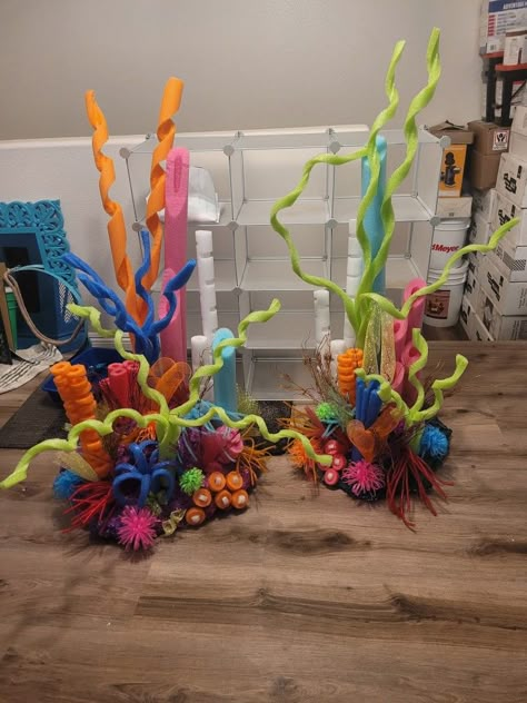 Coral reef made of spray foam and pool noodles Pool Noodle Sculpture, Pool Noodle Sea Creatures, Pool Noodle Ocean Decorations, Coral With Pool Noodles, Under The Sea Adult Party, Pool Noodle Under The Sea, Pool Noodle Flowers, Pool Noodle Palm Tree, Pool Noodle Art