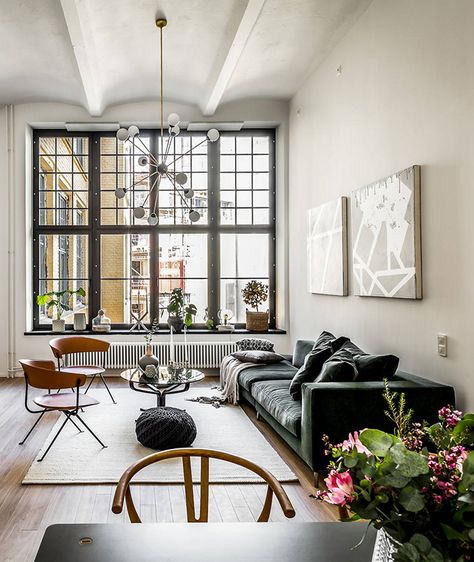 super high ceilings and oversized black framed windows hint at the industrial past of this stockholm apartment, featuring simple elegant styling and palette House Scandinavian, Rooms Apartment, Stockholm Apartment, White Room Decor, Scandinavian Style Home, Scandinavian Apartment, Apartment Living Room Design, Black Windows, 아파트 인테리어