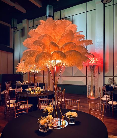 An opulent Birthday celebration at Bandrika Studios, where our ostrich feather centerpieces and glowing floor stands transformed the evening into a feast of elegance and style ✨😍🎇 • ��• • #ostrichfeathers #ostrichfeathercenterpieces #tablesetting #tablescape #tablestyling #weddingdecor #birthdaydecoration #featherfloorstand #rentfeathers #greatgatsby #greatgatsbyparty #birthdaideas Feathers Centerpieces, Ostrich Feather Decor, Ostrich Feather Centerpieces, Moms 60th, Feather Centerpieces, Roaring 20, Great Gatsby Party, Dirty 30, Feather Decor