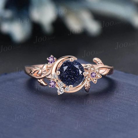 Nature Inspired Round Galaxy Blue Sandstone Amethyst Wedding Ring Unique Moon Leaf Vine Blue Goldstone Engagement Ring Art Deco Promise Ring Engagement Ring: round cut alexandrite The side stones are amethyst and moissanite Material Metal: 925 sterling silver, Solid 10k/14k/18k gold,platinum This jewelry is made to order, it can be made with any gemstone/metals. 2-3 weeks to finish. Default Shipping method is usps. 30 days non-hassle return policy.For returned items,there may be handcrafting and Gemstone Wedding Rings Brilliant Earth, Luxury Celestial Moonstone Ring With Accent Stones, Luxury Gemstones For Promise Rings, Luxury Multi-stone Crystal Promise Ring, Cheap Crystal Promise Ring With Diamond Accents, Luxury Crystal Promise Ring With Stones, Luxury Gemstone Stackable Rings For Promise, Luxury Celestial Diamond Promise Ring, Luxury Rings With Natural Stones For Promise