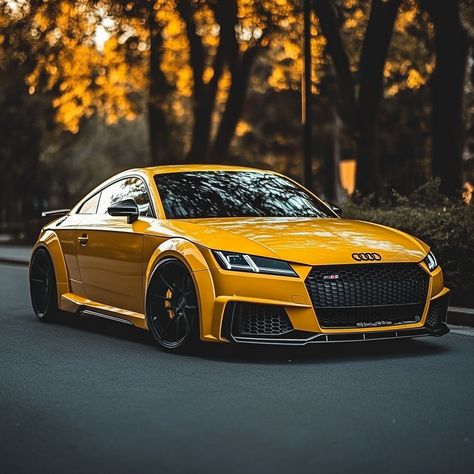 Sleek Audi TT RS, 2019, vibrant yellow. Aggressive styling, quattro all-wheel drive. Audi's RS division pushes limits. 🟡🏎️💨 2.5L turbocharged engine roars with iconic 5-cylinder symphony. Autumn backdrop enhances sporty allure.  Hashtags below 👇  #AudiTTRS #QuattroPerformance #YellowBeast #AudiSport #CarEnthusiast October Wallpapers, Autumn Backdrop, Audi Sports Car, Audi Tt S, Audi Tts, October Wallpaper, Audi Tt Rs, Autumn Sunset, Audi A3 Sportback