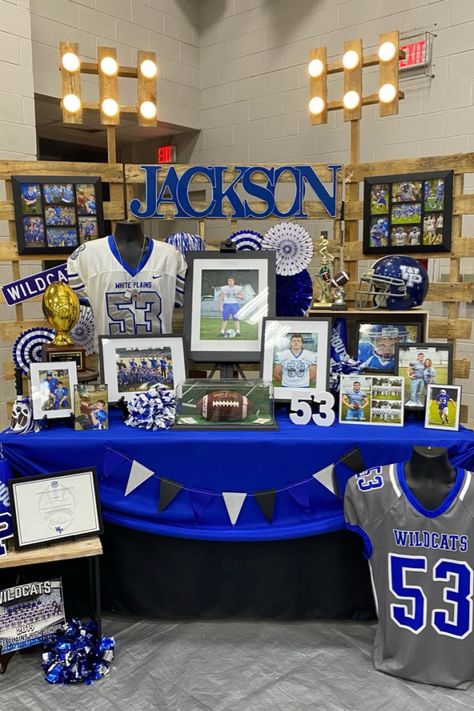 Jersey Display Graduation Party, Graduation Center Piece Ideas For A Boy, Boys Open House Ideas, Senior Memory Table Ideas, Senior Graduation Party Ideas High School Memory Table, Baseball Signing Day Table, Graduation Decoration Ideas For Boys, Grad Party Sports Display, Highschool Graduation Party Ideas Boys