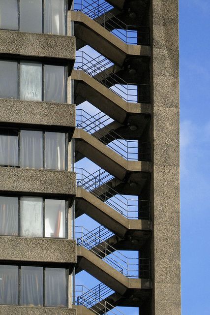 BARBICAN ESTATE | CITY OF LONDON | LONDON | ENGLAND: *Built: 1965-1976; Officially Opened: 1969; Architects: Chamberlin, Powell and Bon; Grade II Listed* Photo:  mira66, via Flickr Fire Escape Stairs, Barbican Estate, Barbican London, Brutalism Architecture, Exterior Stairs, London Architecture, Fire Escape, City Of London, Brutalist Architecture