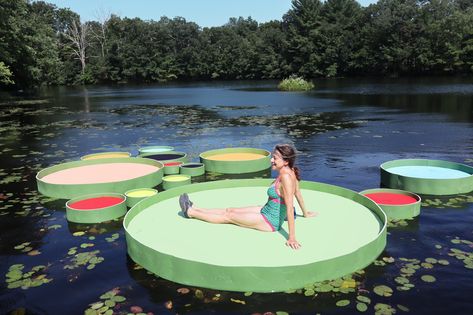 The Lily project was designed and installed by Jaemee Studio during their artist’s residency period at the I-Park Foundation, located in East Haddam, Connecticut. Inspired by lily pads floating at a pond adjacent to Eightmile River, the Lily Project encourages visitors to have a colorful and playful interaction with monumental nature. Floating Architecture, Interactive Installation, Enjoy Nature, Water Lilies, Public Art, Lily Pads, Landscape Architecture, Installation Art, Connecticut