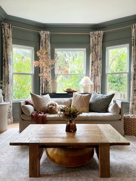 Bay Window Paint Ideas, Intrigue By Benjamin Moore, Intrigue Benjamin Moore, Benjamin Moore Intrigue, Living Room With Bay Window Layout, Cozy Bay Window, Erin Conway, Living Room 2022, Kismet House