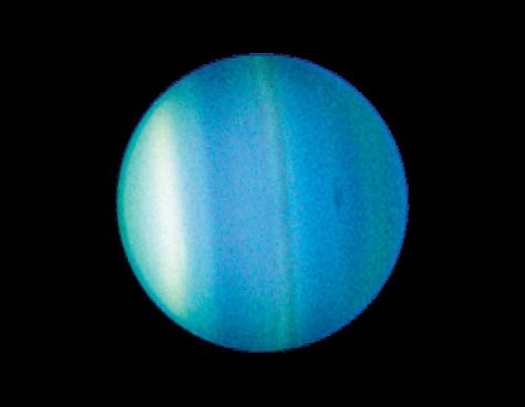 This 2006 image taken by the Hubble Space Telescope shows bands and a new dark spot in Uranus' atmosphere. Nasa Solar System, Ice Giant, Astrology Aquarius, Hubble Images, Planets And Moons, Computer Basics, Hubble Space, Hubble Space Telescope, Space Telescope