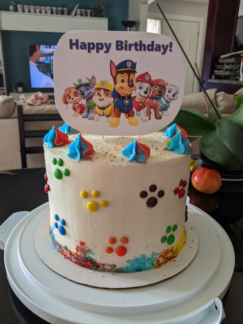 Buttercream icing with 6 layer rainbow cake Number 4 Cake Paw Patrol, Easy Diy Paw Patrol Cake, Rainbow Paw Patrol Cake, Paw Patrol Birthday Cake Buttercream, Homemade Paw Patrol Cake, Paw Patrol Cake Simple, Rocky Birthday Cake, Paw Patrol Buttercream Cake, Paw Patrol Cake Boy