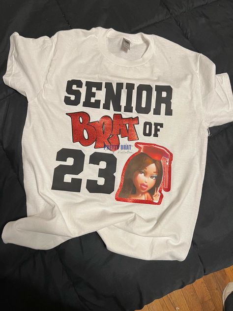 Sasha is a senior brat who loves to show off her body in this hot shirt! #senior #brat #shirt Senior Cricut Shirts, Senior Sister Shirts 2023, Senior Night Shirts 2023, The Proud Senior Shirt, Funny 2023 Senior Shirts, My Last First Day Of School Senior Shirt, Bedazzled Class Shirt, Cheap Tops For Graduation With School Spirit, Class Pf 2023 Shirts