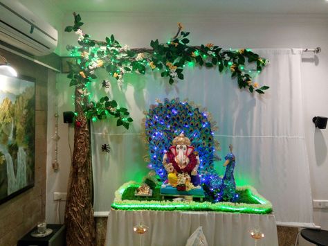 Ganesh chaturthi decoration Best Ganpati Decoration At Home, Aarti Decoration, Ganpati Backdrop, Ganesha Decoration, Flower Decoration For Ganpati, Luxury Dining Room Tables, Eco Friendly Ganpati Decoration, Chaturthi Decoration, Kalash Decoration