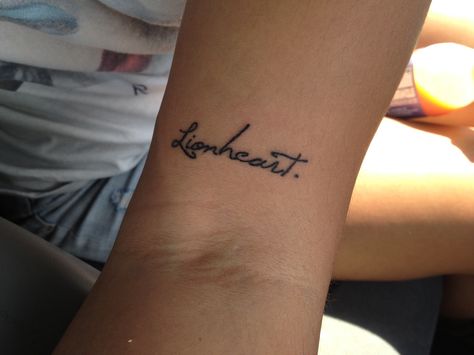 Lionheart. Inner elbow tattoo. Lionheart Tattoo, Arm Crease Tattoo, Tattoo Never Give Up, Shoulder Piece Tattoo, Inner Elbow Tattoos, M Tattoos, Word Tattoo, Ancient Tattoo, 13 Tattoos