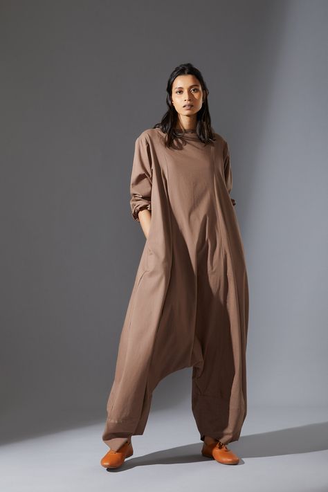 Looking for that perfect piece to comfortably lounge about in at home that also looks edgy in when you're out and about it? Well... we've found it! The Beats Jumpsuit is made from 100% handwoven cotton, has those all important pockets and adjustable sleeves. Features a back button opening and balloon-style bottoms. Wear with trainers. Choose from your favourite colour too. Sizing: Choose the customised option for a petite length or for size 7L+, and email us your request. Please see the Size & F Edgy Jumpsuit, Street Style Wear, Boat Neck Jumpsuit, Beige Jumpsuit, Balloon Pants, Cotton Jumpsuit, Uk Size 16, Pants Fit, Favourite Colour