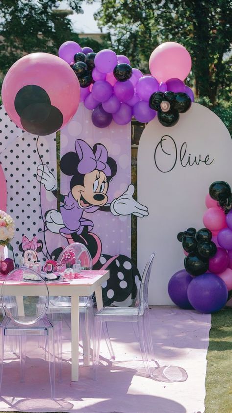 Minnie Mouse-themed birthday setup with pink and purple balloons, Minnie Mouse decorations, and a personalized backdrop. Party Ideas For Girls, Unique Birthday Party Ideas, Unique Birthday Party, First Birthday Party Ideas, Minnie Mouse First Birthday, Balloon Arrangements, Purple Decor, Girl First Birthday, Birthday Party Ideas