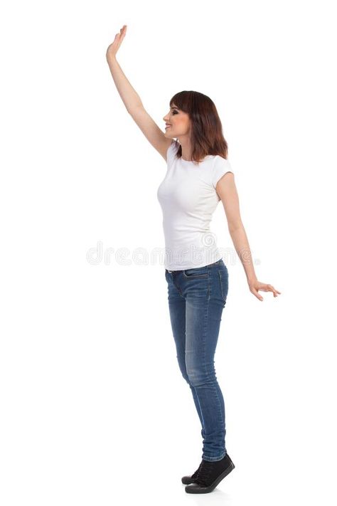 Young Woman In White T-shirt And Jeans Is Standing TipToe And Waving Hand. Side View. Stock Photo - Image of length, enjoy: 102997358 Waving Hand Pose Reference, Hand Side View, Waving Hand, Walking Poses, Woman In White, People Poses, Anatomy Poses, Standing Poses, Female Anatomy