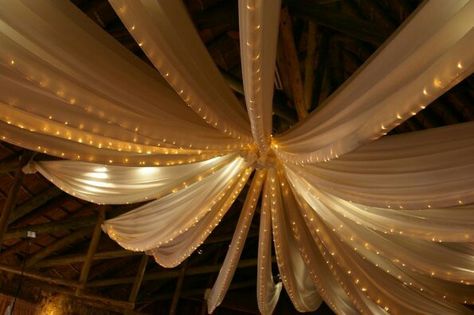 Roof draping with fairylights Roof Draping Ideas, Diwali Gift Box, Draping Ideas, Roof Decoration, Wedding Draping, Barn Dance, Dance Ideas, Diwali Gifts, Draped Fabric