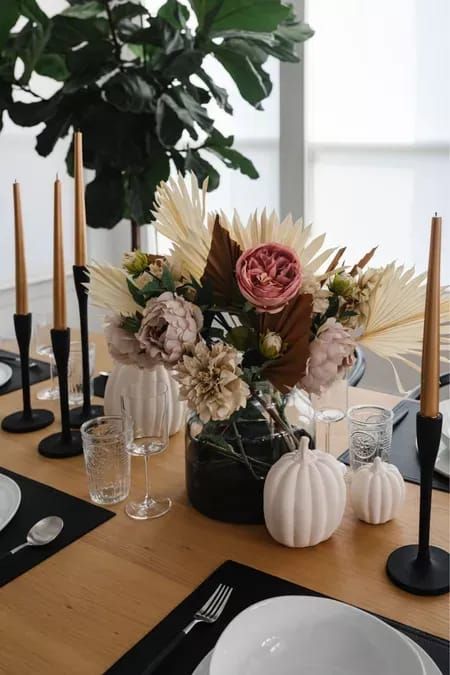 Fall tablescape in our dining room! Love this fall decor with faux florals, white pumpkins, sleek gold candlesticks, dipped vase from McGee & Co, Studio McGee’s shop and more. We got new flatware recently and love the modern look. #LTKhome #LTKSeasonal #LTKstyletip Modern Candlesticks, Fall Dining Table Decor, Fall Dining Table, Craft Pumpkins, Black Candle Holders, Black Candle, Fall White, Gold Candle Sticks, Tablescape Inspiration