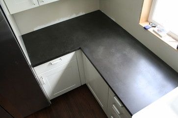 They used a charcoal pigment AND a black acid stain to get this shade. Black Concrete Counter Tops - Traditional - Kitchen - tampa - by GreenStone Concrete Designs Black Stained Concrete, Black Concrete Countertops, Concrete Countertop Ideas, Outdoor Concrete Countertops, Kitchen Remodel Countertops, Black Concrete, Outdoor Kitchen Countertops, Concrete Countertop, Beton Design