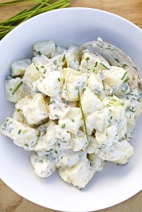 No barbecue is complete without a bowl of delicious potato (or pasta) salad on the picnic table. This recipe is simple with few ingredients. The tarragon and chives in the creamy dressing gives this potato salad a unique flavor. It is still mild in nature and complements any meal. Add this potato salad recipe to your list of summer must makes! Salad With Herbs, Creamy Potato Salad, Creamy Dressing, Potato Salad Recipe, The Picnic, Boiled Potatoes, Potatoe Salad Recipe, Veggie Sides, Few Ingredients