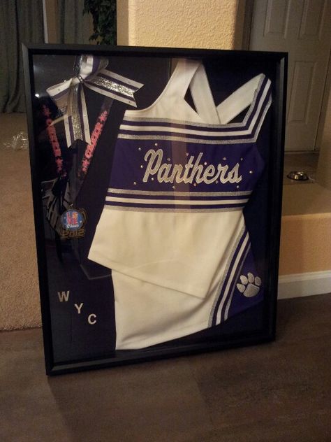 I decided to frame my daughters Cheer uniform in a shadow box. Best thing to do with an old uniform! Cheer Uniform Shadow Box, Cheerleader Art, Cheerleading Crafts, Cheer Pins, Cheer Banquet, Cheer Gear, Cheer Leading, Cheer Uniforms, Cheer Spirit