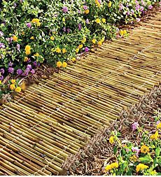 Bamboo Garden Pathway...Rot-Resistant Woven Together with Sturdy Black Nylon Coated Wire... Bamboo Landscaping, Bamboo Landscape, Garden Walkway, Bamboo Garden, Bamboo Plants, Diy Pergola, Garden Pathway, Garden Edging, Garden Borders