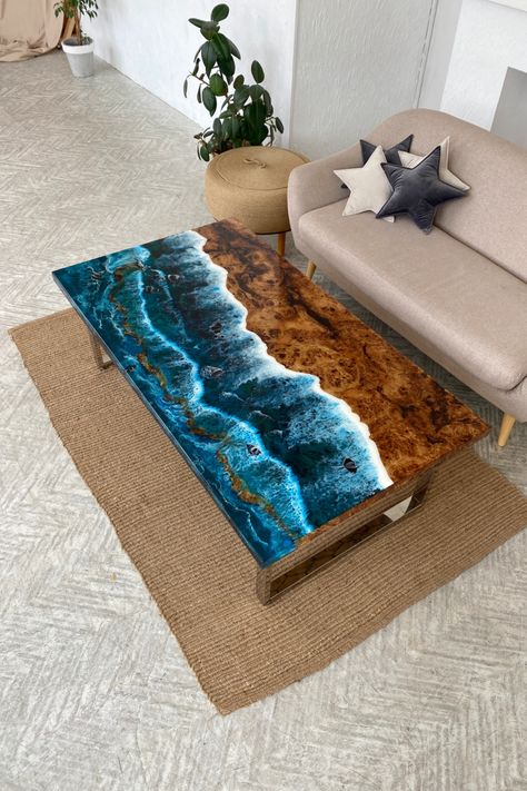 Оcean epoxy resin tables will fancy those who constantly miss the fresh ocean breeze when forever stuck behind the desk! Liven up those endless homeworking hours with this lovely epoxy table beautifully adorned with beach imagery. Being a perfect combination of natural wood and turquoise epoxy resin, these living room tables will always remind of celestial blue and white foamy waves crashing the golden shore every time you take a sip of coffee or have a home lunch break! Dine Table, River Tables, Wood Slab Table, Beds For Small Spaces, Baroque Furniture, Table Live Edge, Epoxy Countertop, Table Epoxy, Slab Table