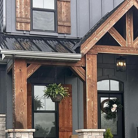 𝒥𝓊𝓁𝒾𝑒 on Instagram: "Spring front porch 🪴 Siding: James Hardie Cement Board/night gray Rough Cedar: Pittsburgh Stain - Warm teak . . #plants #spring #farmhousefrontporch #frontporch #frontporchdecor #springdecor" Dark Stained Front Porch, Gray And Cedar House Exterior, Night Grey Hardie Siding, Night Gray Hardie Siding, Iron Gray Hardie Siding, Dark Siding House, Dark Siding House Exterior Colors, James Hardie Siding Colors, Cedar Wood Siding