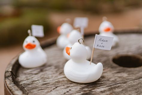 If your wedding venue has a fountain, why not use it as an entertainment feature. Hook a duck is great for fun, unique and cheap wedding entertainment. It can also double up as your seating chart! Place guests names on the ducks and get them to hook them out to find out where they're sitting! Cheap Wedding Entertainment, Duck Themed Wedding, Hook A Duck, Wedding Entertainment Ideas, Place Holders, Wedding Favor Table, Marriage Ideas, Wedding Aesthetics, 2025 Wedding