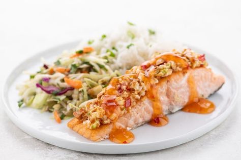 The sweet and slight heat of chili sauce and the crunchy saltiness of the classic peanut tops this salmon with texture, flavor, and, well, pure perfection. Crunchy slaw and soft rice on the side further the textural contrast, as well as the amazing flavors. Sesame Slaw, Homechef Recipes, Thai Peanut, Crusted Salmon, Salmon Recipe, Meal Delivery Service, Sweet Chili Sauce, Meal Kit, Recipe Steps