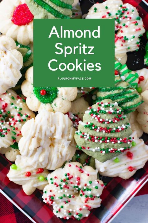 Buttery Almond Spritz Cookies are decorated for Christmas Almond Spritz Cookies, Spritz Cookie Press, Spritz Cookie Recipe, Christmas Cookie Recipes Holiday, Italian Cookie Recipes, Easy Christmas Cookie Recipes, Spritz Cookies, Almond Extract, Christmas Cookie Exchange