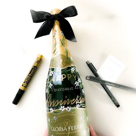 Sakura of America on Instagram: "One of my most beloved works and what I became most known for, is my painted champagne bottles. I’ll be teaching a class for painted custom champagne bottles in May of this year! It’s �“The Fine Art of Bottle Painting” Follow along @thehautepress and visit www.learncalligraphy.com to learn about enrollment coming up in just a few months! Sakura PenTouch Paint pen and the Microperm black ultrafine pen helped create a beautiful finish. The PenTouch paint pen is also Painted Champagne Bottles, Painting Bottles, Custom Champagne Bottle, Champagne Bottles, Bottle Painting, Paint Pens, A Class, This Year, Champagne