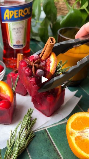 796K views · 5.6K reactions | With fresh orange slices, cranberries, and rosemary, this winter Aperol Spritz is packed with festive flavors and perfect for entertaining🥂 | By Live Eat Learn | Calling all Aperol Spritz lovers, here's a way to enjoy Aperol all year round. If you saw my Aperol ice cubes that went totally viral a few months ago, you'll know that I love convenience when it comes to cocktails and I also love Aperol Spritzs. So, I like to keep these cranberry ice cubes in the freezer so whenever cocktail time comes around, I can just pop them out and whip up some cranberry apparel spritzes. Arrange that ice cube tray however you want. Make sure to use some orange slices and cranberries but you can also add in some fresh herbs or spices and then fill it to the top with cranberry Cranberry Orange Aperol Spritz, Cranberry Aperol Spritz Ice Cubes, Aperol Ice Cubes, Cranberry Ice Cubes, Winter Aperol Spritz, Alcoholic Milkshake, Cranberry Ice, Fancy Ice Cubes, Aperol Spritz Recipe