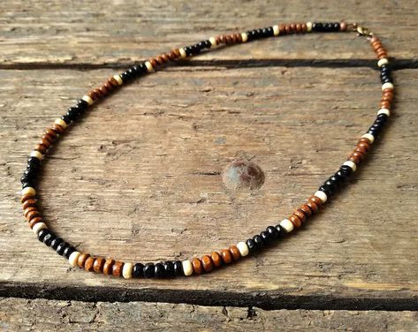 #Brown and #Black #wooden #beaded #necklace #handmade by reccabella #Etsyshop #Etsyseller #madeintheuk #handmadejewellery #bohojewellery #beadedjewellery #giftideas #giftformum #giftforher #woodennecklace #surferstylenecklace #surfernecklace #surferstyle #beadednecklace #giftforhim #mensnecklace #boyfriendgift #boyfriendnecklace #Brownandblackbeadednecklace #woodenbeadednecklace Wooden Necklace Handmade, Necklace Man, Boyfriend Necklace, Man Necklace, Brown Beaded Necklace, Mens Beaded Necklaces, Wooden Bead Necklaces, Surfer Necklace, Brown Necklace