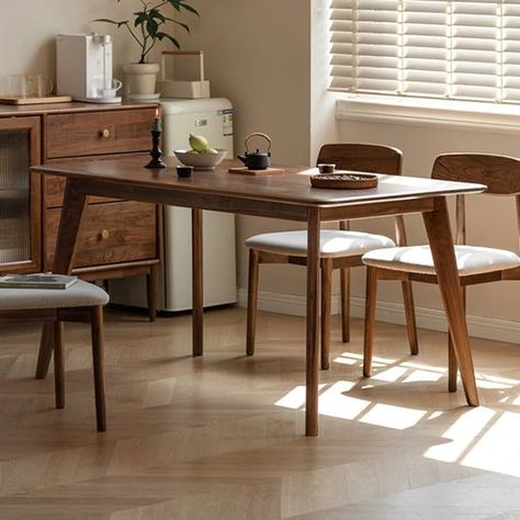 A simple dining table without extra complicated design. The slightly flared slanted legs are visually lighter and more stable. Made entirely of North American FAS-grade black walnut, it feels as delicate as silk. It has a high collection value and can accompany you for a long time Dark Wood Table Dining, Dining Table Dark Wood, Dark Dining Table, American Dining Table, Color Dining Table, Black Walnut Table, Simple Dining Table, Dark Wood Table, American Black Walnut