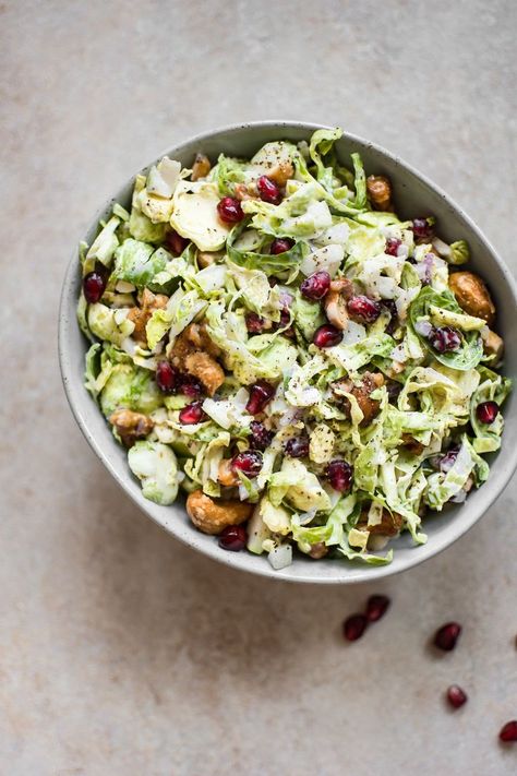 This winter Brussels sprouts slaw is loaded with goodies like candied cashews and pomegranate arils. A gorgeous side dish perfect for the holidays! Brussels Sprouts Slaw Recipe, Candied Cashews, Salt Lavender, Shredded Brussel Sprouts, Shrimp Recipes Healthy, Grilled Eggplant, Vegan Side Dishes, Slaw Recipes, Spinach Salad