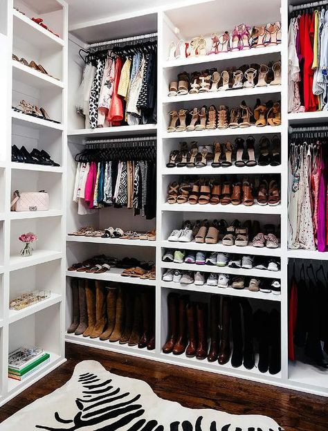 Tilted closet shoe shelves display shoes with an organized fashion in a white built-in closet system. Walking Closet Ideas, Shoe Shelf In Closet, Organized Closet, Walking Closet, Walk In Closet Design, Shoe Shelves, Closet Remodel, Build A Closet, Closet Decor